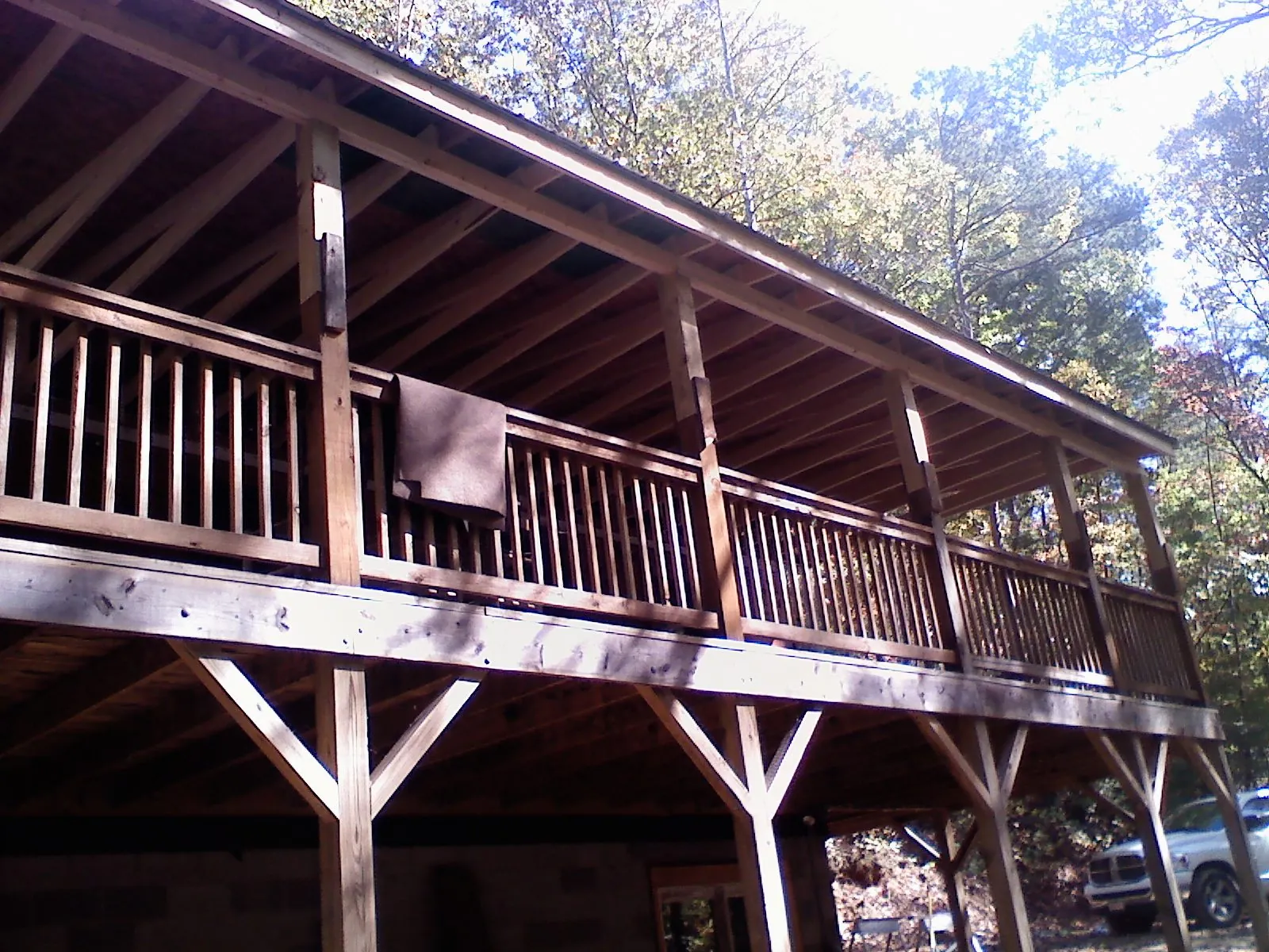 Timber framing under a new elevated porch and deck — Roof Leak Repair in Vida by Roofing Brothers